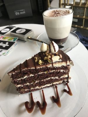 Hot chocolate & chocolate~pistachio cake at De Aca in San Jose