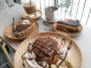Coffee tart, vietnamese coffee, blueberry cheesecake and pancakes. All vegan. at Ohms Cafe & Bar in Hong Kong Island