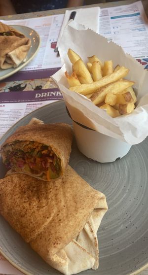 Falafel and avocado wrap😍💗 and chips! at Faro Lounge in Lichfield