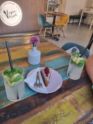 Fresh lemon and mint drink and a cranberry cake at Vegan Kiosk in Bratislava