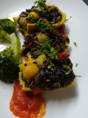 Pimientos rellenos de arroz venere y verduras at Petiscos in Santiago De Compostela