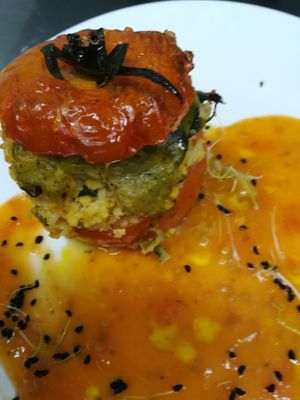 Tomate asado relleno de bulgur y verduras at Petiscos in Santiago De Compostela