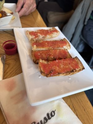 Pan con tomate  at Gusto Ristobar in Sevilla