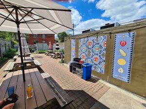 Outdoor seating (backyard) at Pie-Sci in Detroit