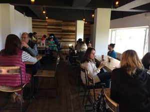 The material for the walls, chairs, tables, lamps, etc. are reused. at Tandana in Quito