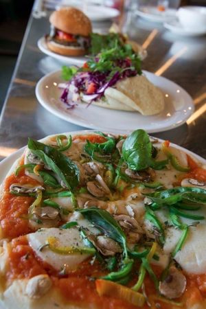 Vegan pizza, falafel and hamburger. at Tandana in Quito