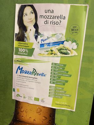 Sign with what cheese they use, made of rice   at LA Pizza in Aviano