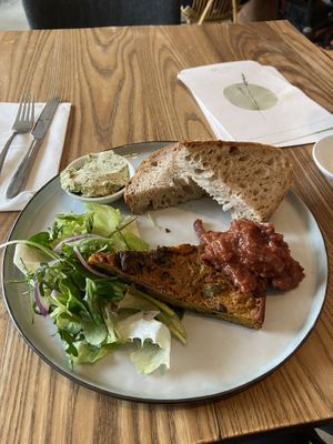 Frittata: quite nice. The bread is good (fluffy and crispy) and the frittata is quite good as well. However, no legumes, nuts or seeds as a protein source. at BROEI in Utrecht
