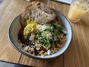 Shakshuka (tasty) and kombucha with lychee/ginger (very good)  at BROEI in Utrecht
