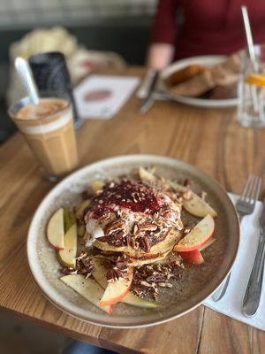 Pancakes with spiced syrup, pecans, coconut cream and stewed/fresh fruit (11,50, amazing!)🥞  at BROEI in Utrecht