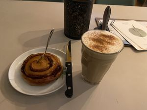 Cinnamon roll (used to be better) and chai latte (tasty)  at BROEI in Utrecht