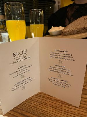 Menu from the fine-dining Christmas experience. A 5-course menu including an alcoholic OJ starter and sourdough with miso butter for about €60 p.p.  at BROEI in Utrecht