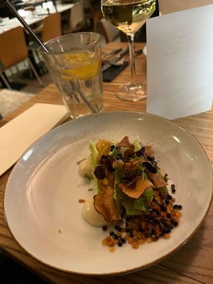 Jerusalem artichoke: a mousse and crisps made from this root vegetable with some romaine lettuce and crispy lentils, topped off with a charcoal vinaigrette. My favorite dish!  at BROEI in Utrecht