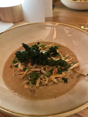 Celeriac: Celeriac “noodles” with a mushroom sauce, kale crisps and Italian parsley. A bit too salty for my liking.  at BROEI in Utrecht