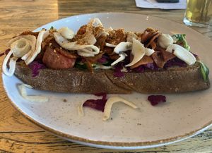 Knolselderij pastrami sandwich: tasty and a bit spicy, but no good protein source (only some tiny tofu crumbles on top)  at BROEI in Utrecht