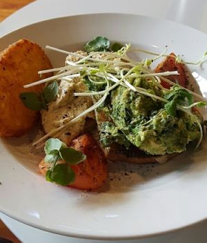 Veganised avo and hummus brekkie with hash brown. Yum! at Cuppa Tea in Richmond