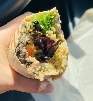 2022.APRIL29- vegan wrap, Middle of wrap small vegan veggie patty appears   at Eat Real Cafe in Santa Clarita