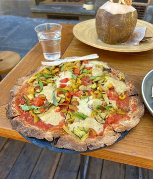 Pizza with Buckwheat Base and Fresh Coconut  at #RAW VEGAN FIRENZE in Florence