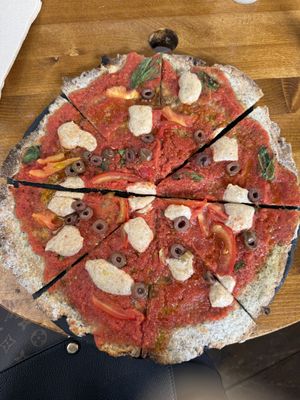 Margarita pizza with added olives oil  at #RAW VEGAN FIRENZE in Florence