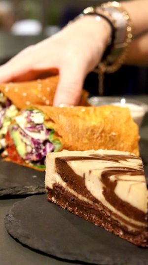 Wraps and raw vegan cakes. The chocolate was killing!  at #RAW VEGAN FIRENZE in Florence