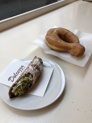 Both vegan ofc; canollo siciliano vagnilia and the other one is with sugar. Both very delicious and the coffee was good as well. Recommendation!  at Bar Dolcezza in Catania