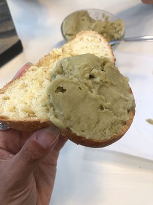 Brioche con granita di pistacchio  at Bar Dolcezza in Catania