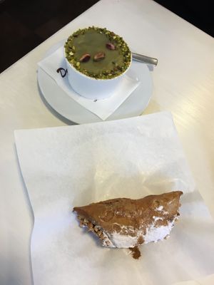 Cannolo and a pistachio desert  at Bar Dolcezza in Catania