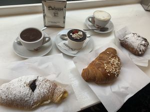 Chocolate, plain and pudding croissant, chocolate milk, Malù chocolate cake and cappuccino    at Bar Dolcezza in Catania