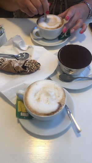 Soy cappuccino, tiramisù and chocolate cannolo  at Bar Dolcezza in Catania