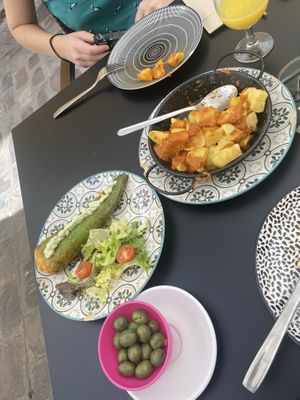 Tortilla-stuffed padron pepper and patatas bravas  at La Veganesa in Cadiz