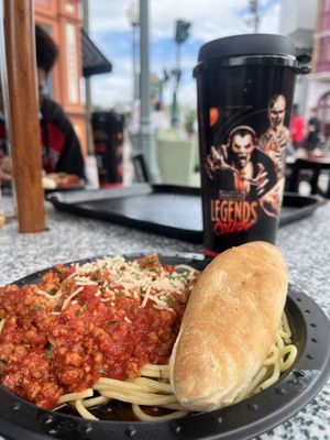 Pasta bolognese with butter free breadstick.   at Louie's Italian Restaurant in Orlando