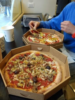 Capricciosa (near) and Vegetariana pizzas at Bella&Brava in Venice