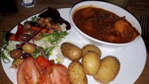 Roasted butternut squash, red onion and cranberry tagine at The Golden Heart Inn in Gloucester