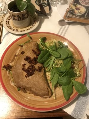 Vegan spelt wheat pancake with smoked tofu, arugula and sun dried tomatoes  at Lahodnosti in Poprad