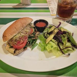 hummus, mushrooms, sprouts, spinach sandwich at Avocado Vegetariano - Centro in Merida