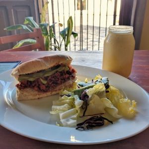 chorizo sandwich and pineapple juice at Avocado Vegetariano - Centro in Merida