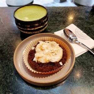 Matcha latte and raw carrot cake. at Pepstop - Riddargatan in Stockholm