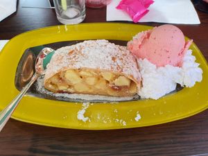 Apfelstrudel with whipped cream and strawberry ice cream at Werners Eiscafe in Wismar