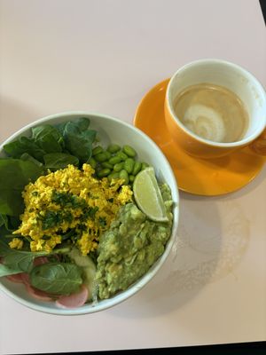 poke bowl with scramble tofu and oat latte  at Hula Juice Cafe in Edinburgh