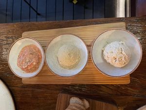 The hummus was pretty bland, but the tomato paste and the ricotta were delicious  at Teva in Rio De Janeiro