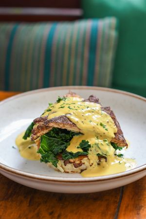 Rostie Tempeh | Tempeh cutlets, creamy a l'Ancienne mustard sauce, Basi.co parmesan and smoked Uai tofu stu ed Rostie potato, garlic sauteed kale. at Teva in Rio De Janeiro