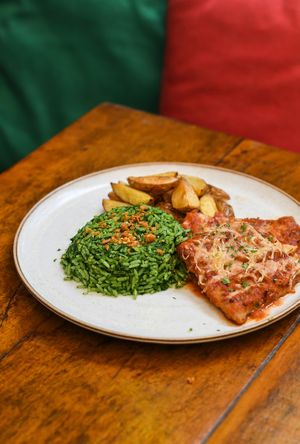 SEITAN OR PORTOBELLO PARMEGIANA
Crusted seitan or Portobello mushrooms, Marinara sauce, Basi.co mozzarela, broccolini rice with garlic, rustic potato wedges. at Teva in Rio De Janeiro