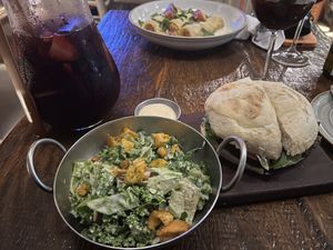 Mushroom burger with a side of Caesar salad   at Teva in Rio De Janeiro