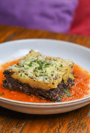 greek lasagna, grilled zucchini and eggplant layers, mushroom and lentil Bolognese, potato Bechamél, mozzarella. at Teva in Rio De Janeiro