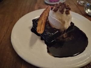 Chocolate brownie w/ coconut and vanilla ice cream. Delicious!  at Teva in Rio De Janeiro