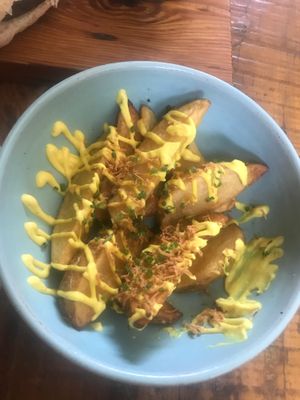 Potato wedges that come with the burger. at Teva in Rio De Janeiro