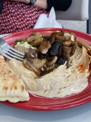 Wow! Meaty mushrooms and grilled onions on hummus. at Tal's Hummus in New Orleans