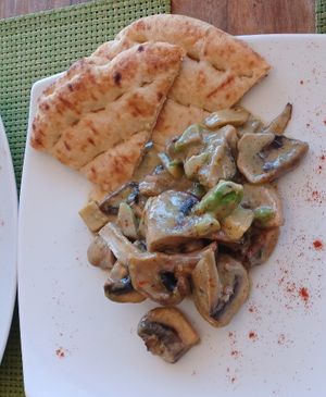 Warm starter dish: Mushrooms with avocado in soy cream and Pita bread. Very yummy. at Sea Vibe in Santorini