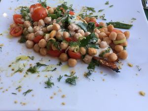 Baked Sweet Potato topped with tahini sauce at Sea Vibe in Santorini