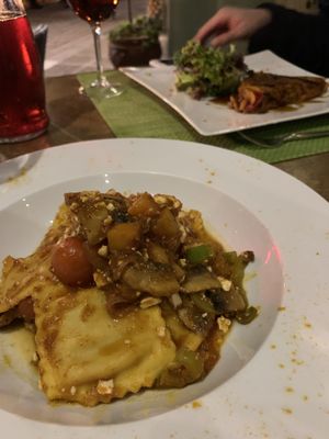 Tofu and pumpkin ravioli and the spiral galaxy. at Sea Vibe in Santorini